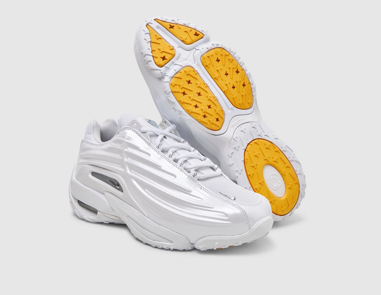 Nike NOCTA Hot Step 2 White / Chrome - University Gold Nike Gray Shoes